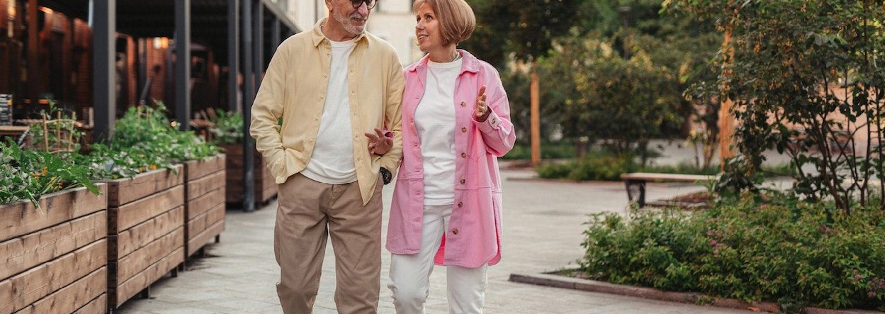 senior couple walking outside - undefined